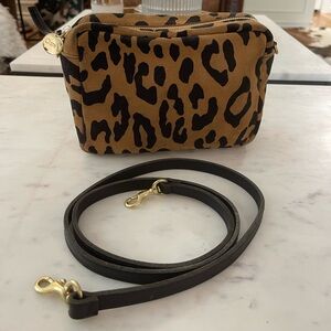 Clare V leopard print suede midi bag with black leather strap.